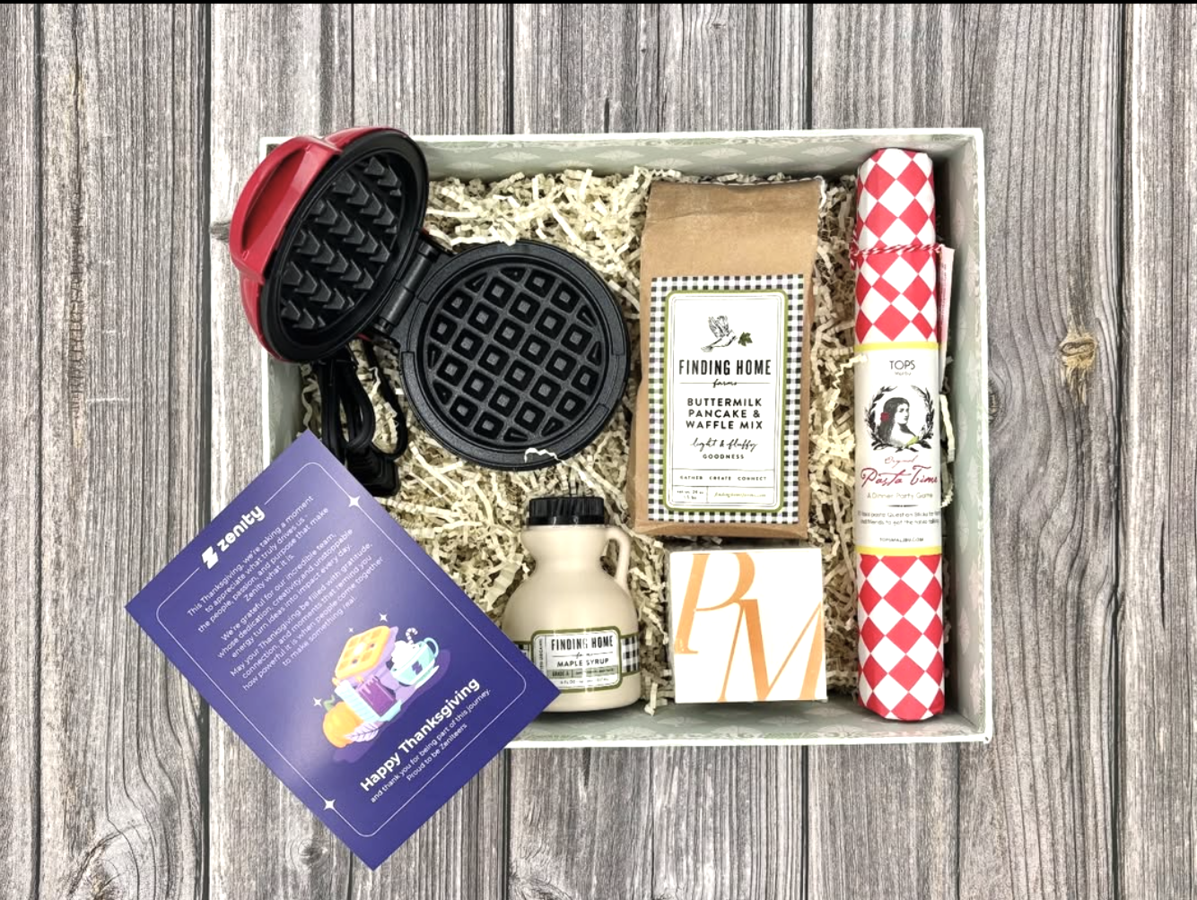 Thanksgiving gift box with a waffle maker, pancake mix and maple syrup